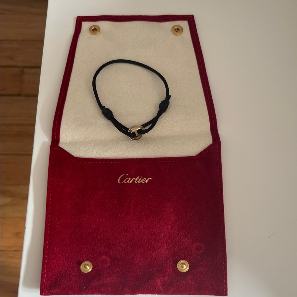 Cartier Black Bracelet with Gold Detail